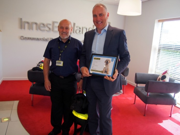 Terry Rodgers (left) and his guide dog Emmett with Tim Garratt managing director at Innes England (resized)